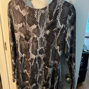 Jennifer Lopez snake print dress.